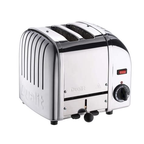 Dualit toaster cleaning  To remove any pieces of bread remaining in the toaster, turn the toaster upside down and gently shake